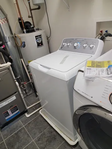a view of a porch with wooden floor and windows