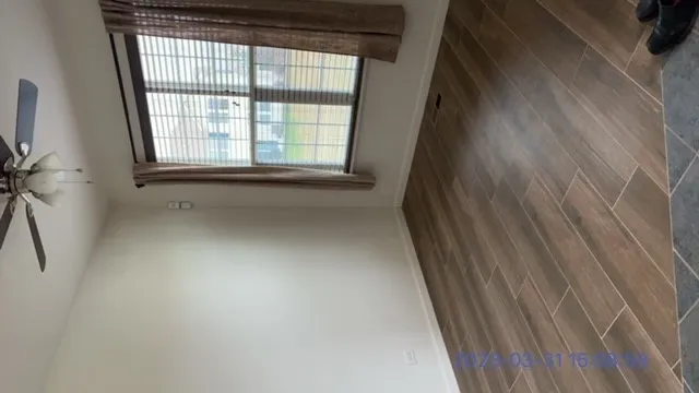 a view of a room that has a window