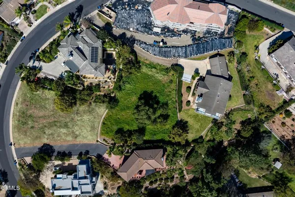 an aerial view of a house with a garden