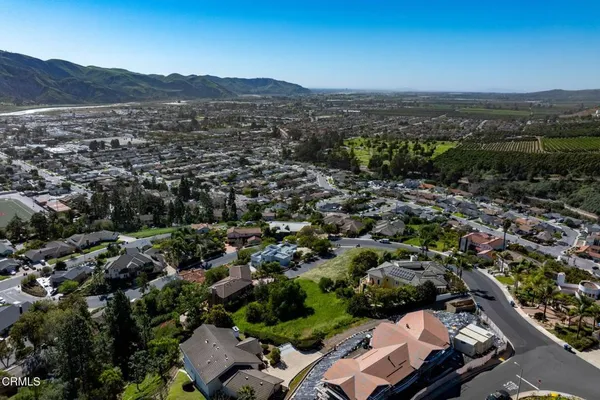 an aerial view of residential house and green space