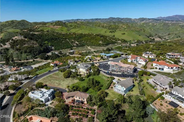 a view of a city with mountains in the background