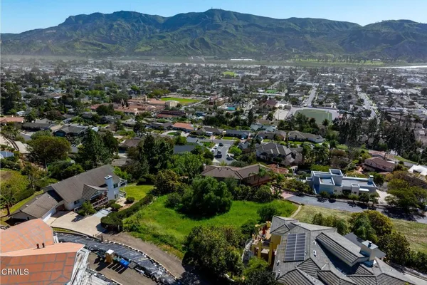 an aerial view of a city with lots of residential buildings