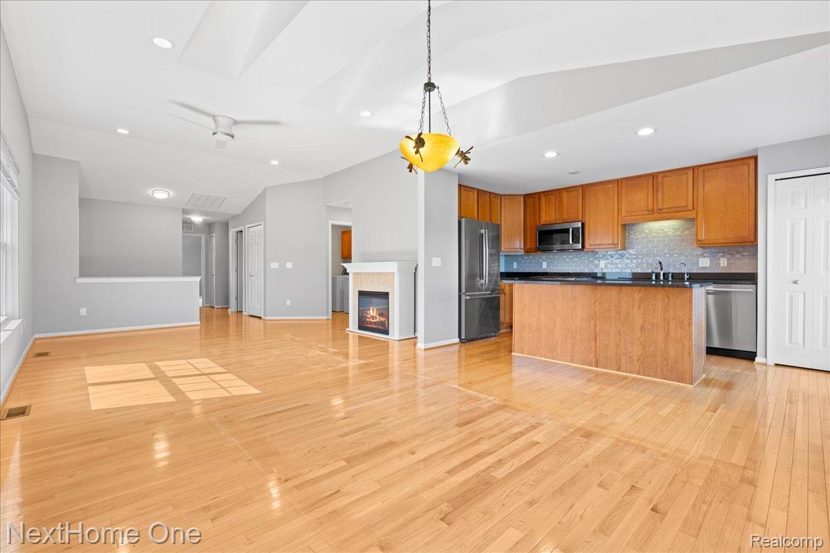 10083 Ridge Run Street, Unit 24 Howell, MI 48855 - Photo 26 of 27 Open floor plan with updated fixtures