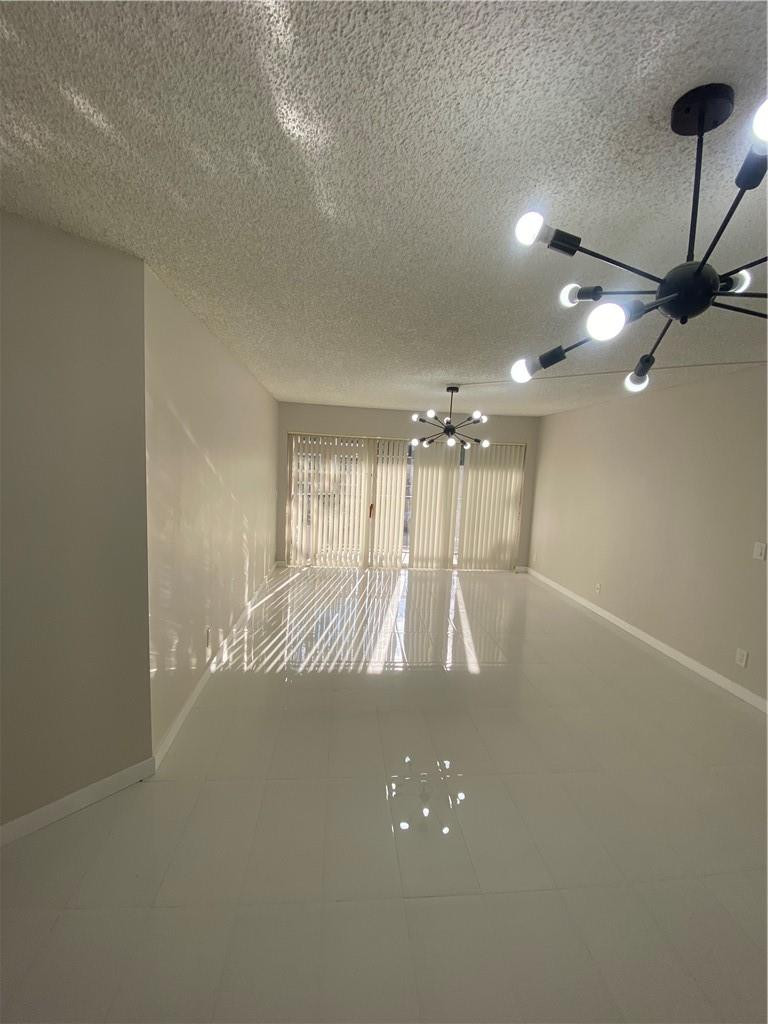 8801 Wiles Road, Unit 207 Coral Springs, FL 33067 - Photo 11 of 31 a view of an empty room
