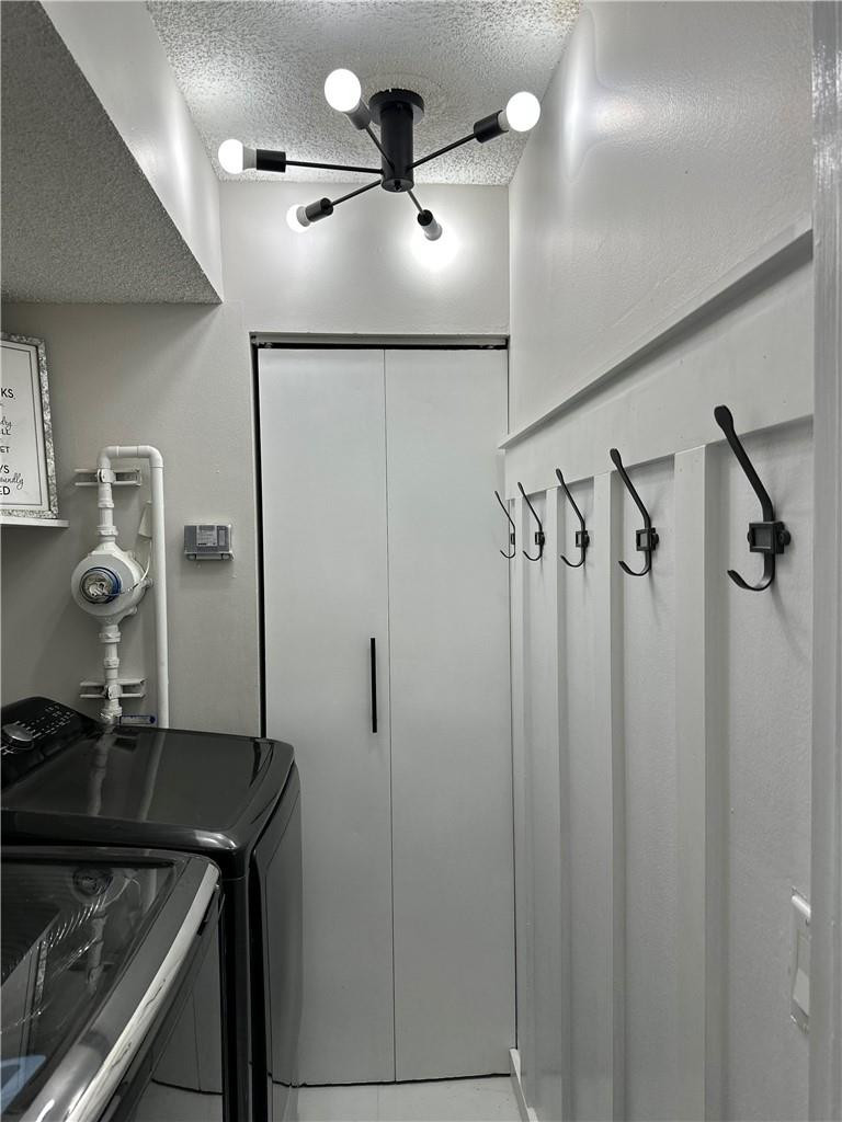 8801 Wiles Road, Unit 207 Coral Springs, FL 33067 - Photo 29 of 31 a bathroom with a shower and a ceiling fan