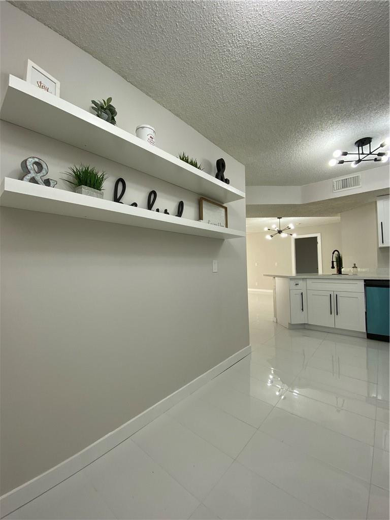 8801 Wiles Road, Unit 207 Coral Springs, FL 33067 - Photo 7 of 31 a close view of utility room