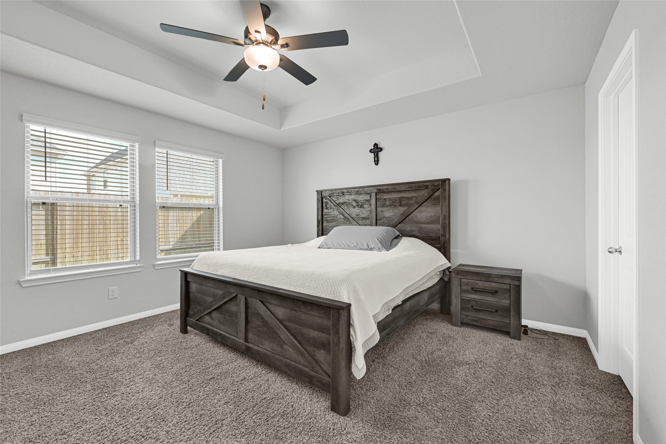 5325 Basquiat Drive Houston, TX 77048 - Photo 12 of 21 a bedroom with a bed and a window