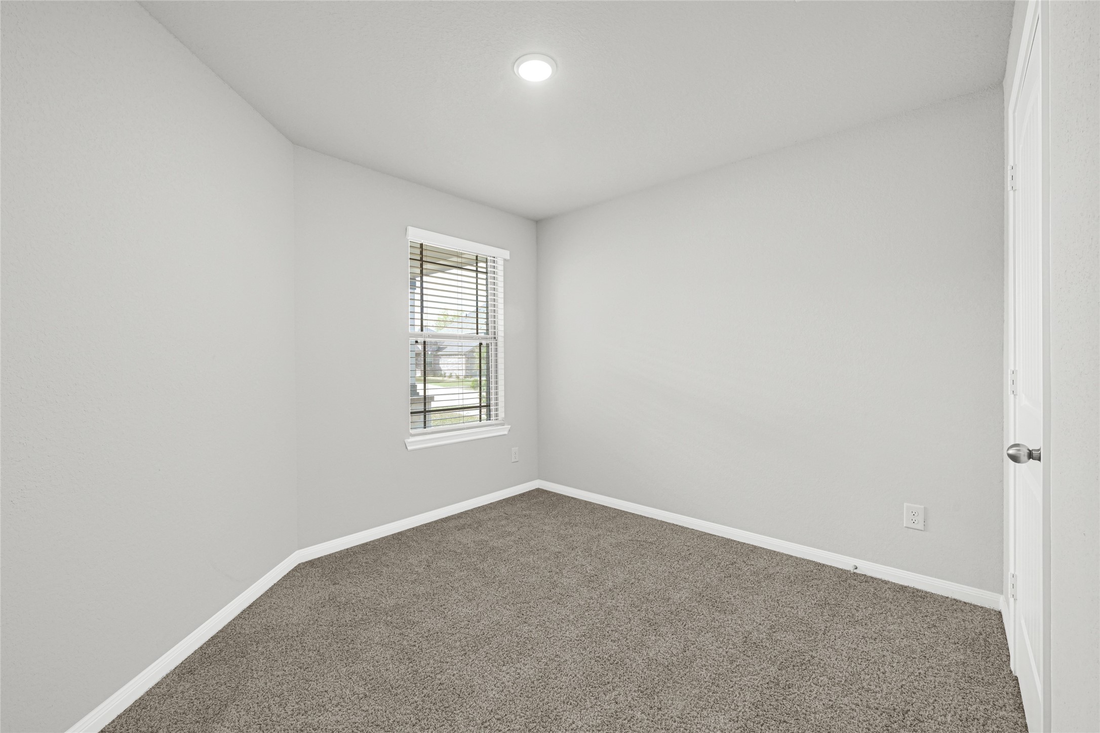5325 Basquiat Drive Houston, TX 77048 - Photo 14 of 21 an empty room with windows
