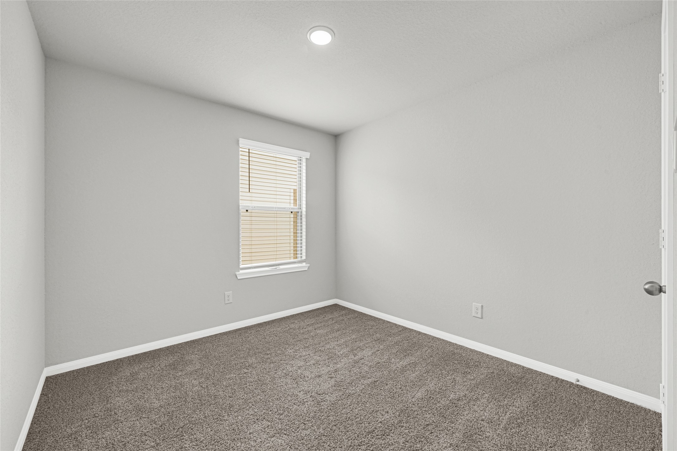 5325 Basquiat Drive Houston, TX 77048 - Photo 16 of 21 an empty room with a window