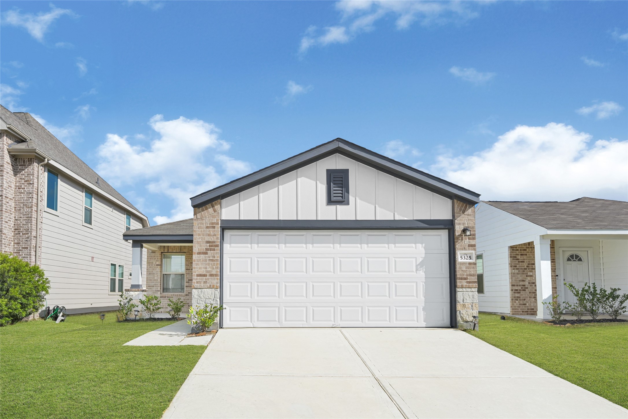 5325 Basquiat Drive Houston, TX 77048 - Photo 2 of 21 a front view of a house with a yard