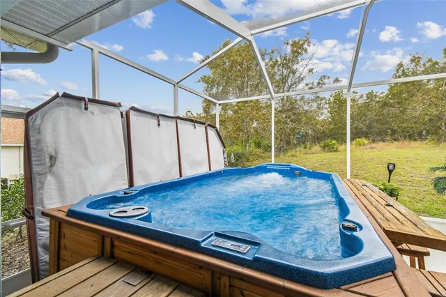a view of a patio with couches chairs and potted plants
