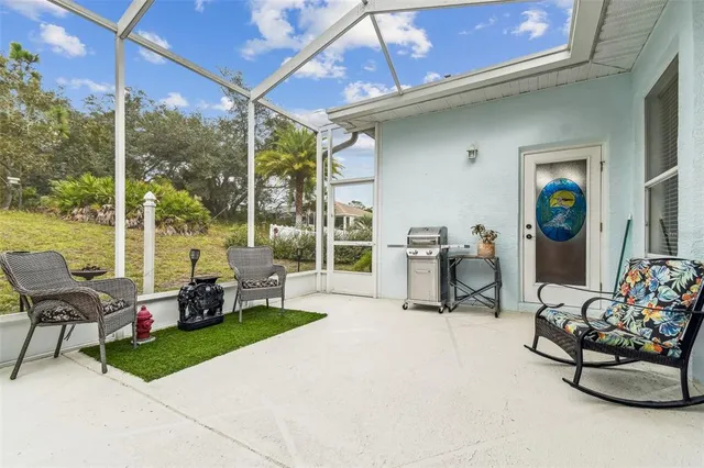 a front view of a house with a garden and yard