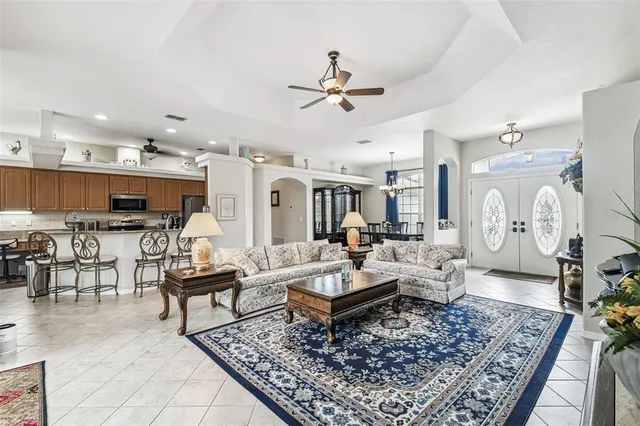 a living room with lots of furniture and rug
