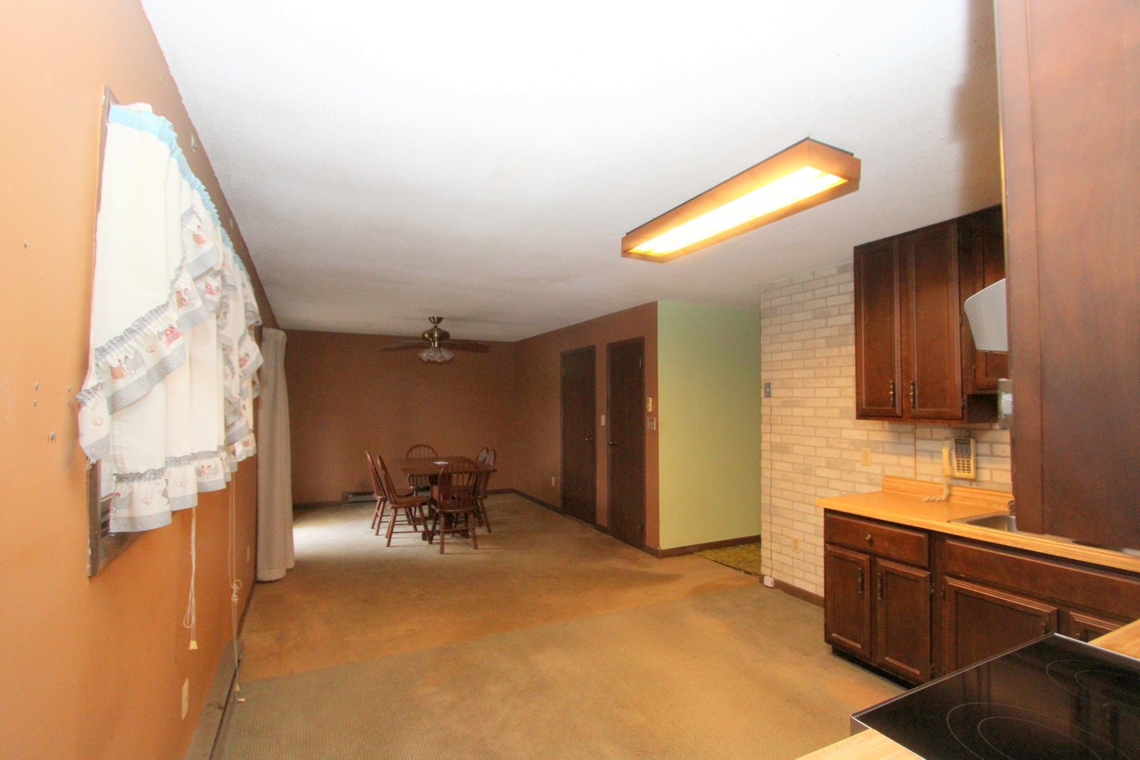 8105 Lawrence Road Harvard, IL 60033 - Photo 3 of 14 a view of living room with furniture and a window
