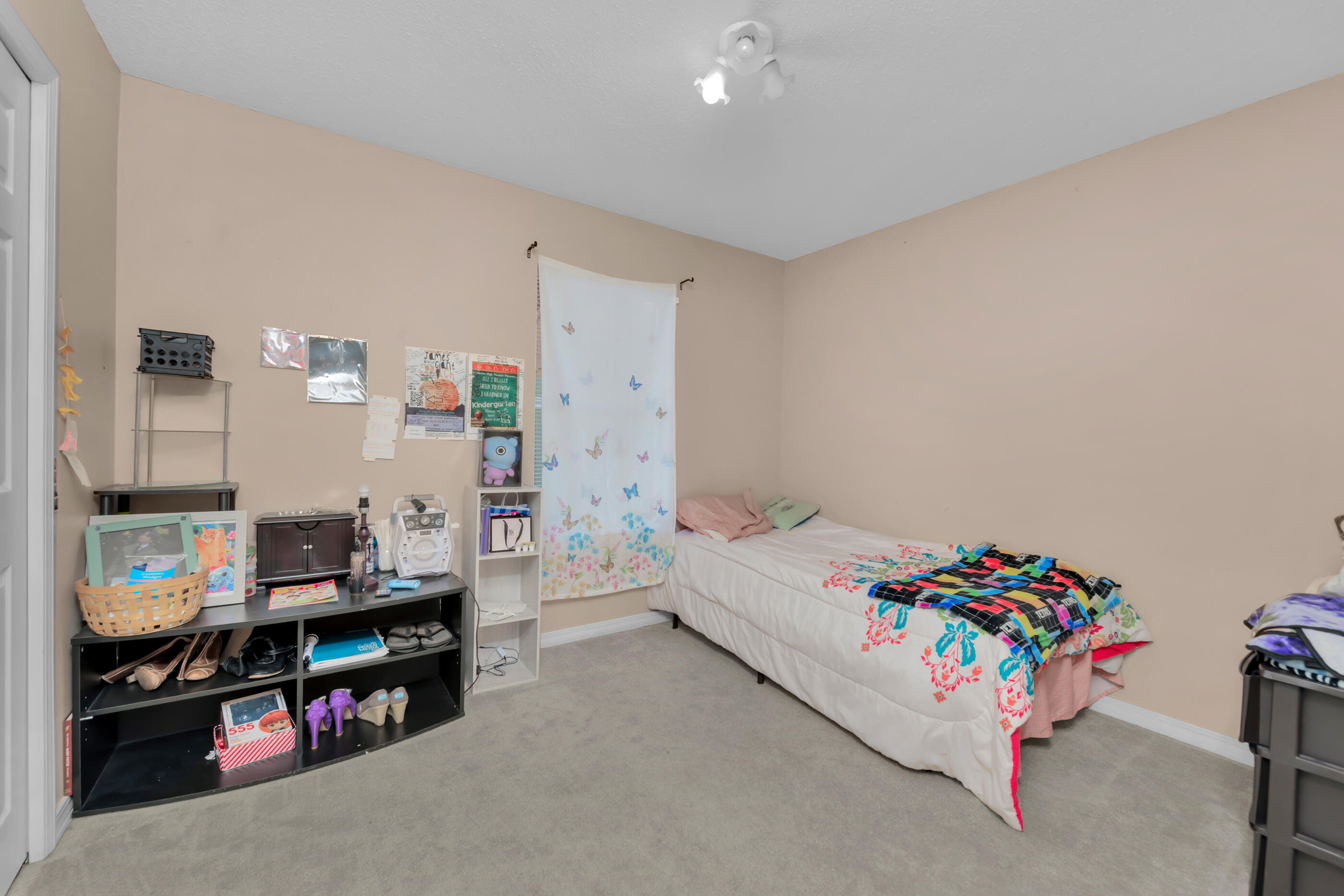 220 Riverchase Boulevard Crestview, FL 32536 - Photo 12 of 24 a bedroom with furniture and a flat screen tv