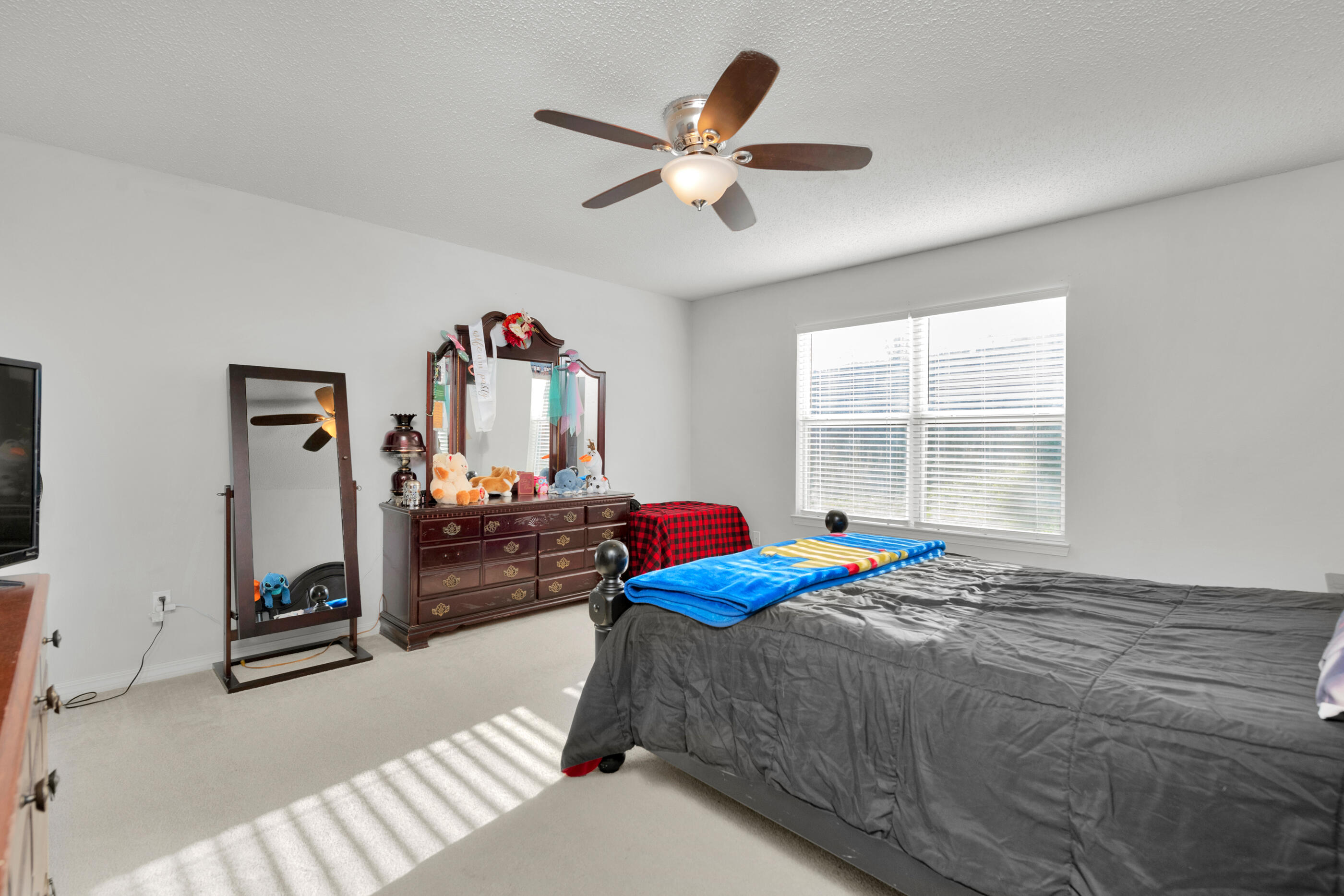 220 Riverchase Boulevard Crestview, FL 32536 - Photo 14 of 24 a bedroom with bed and a large window