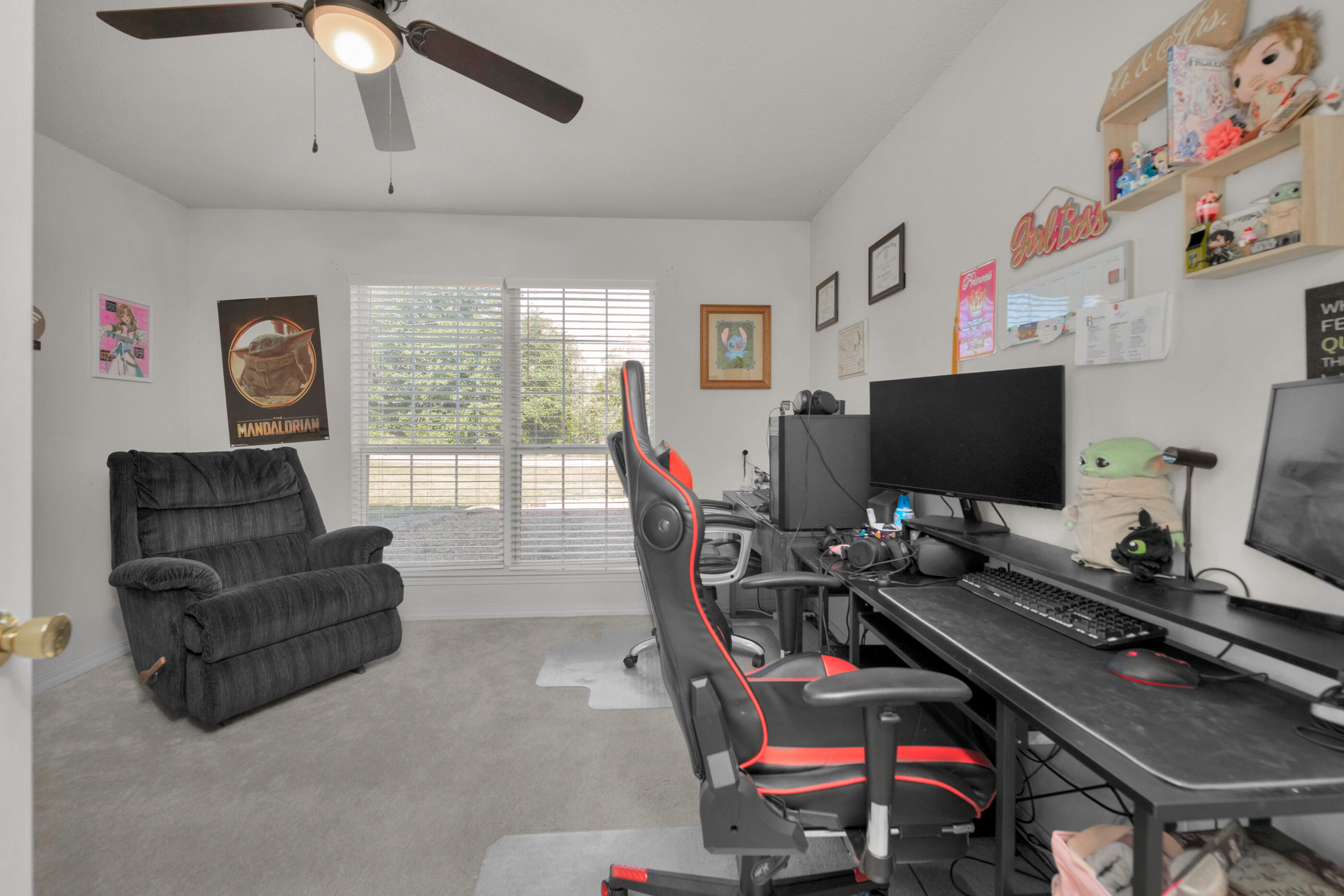 220 Riverchase Boulevard Crestview, FL 32536 - Photo 18 of 24 a bedroom with furniture and a window