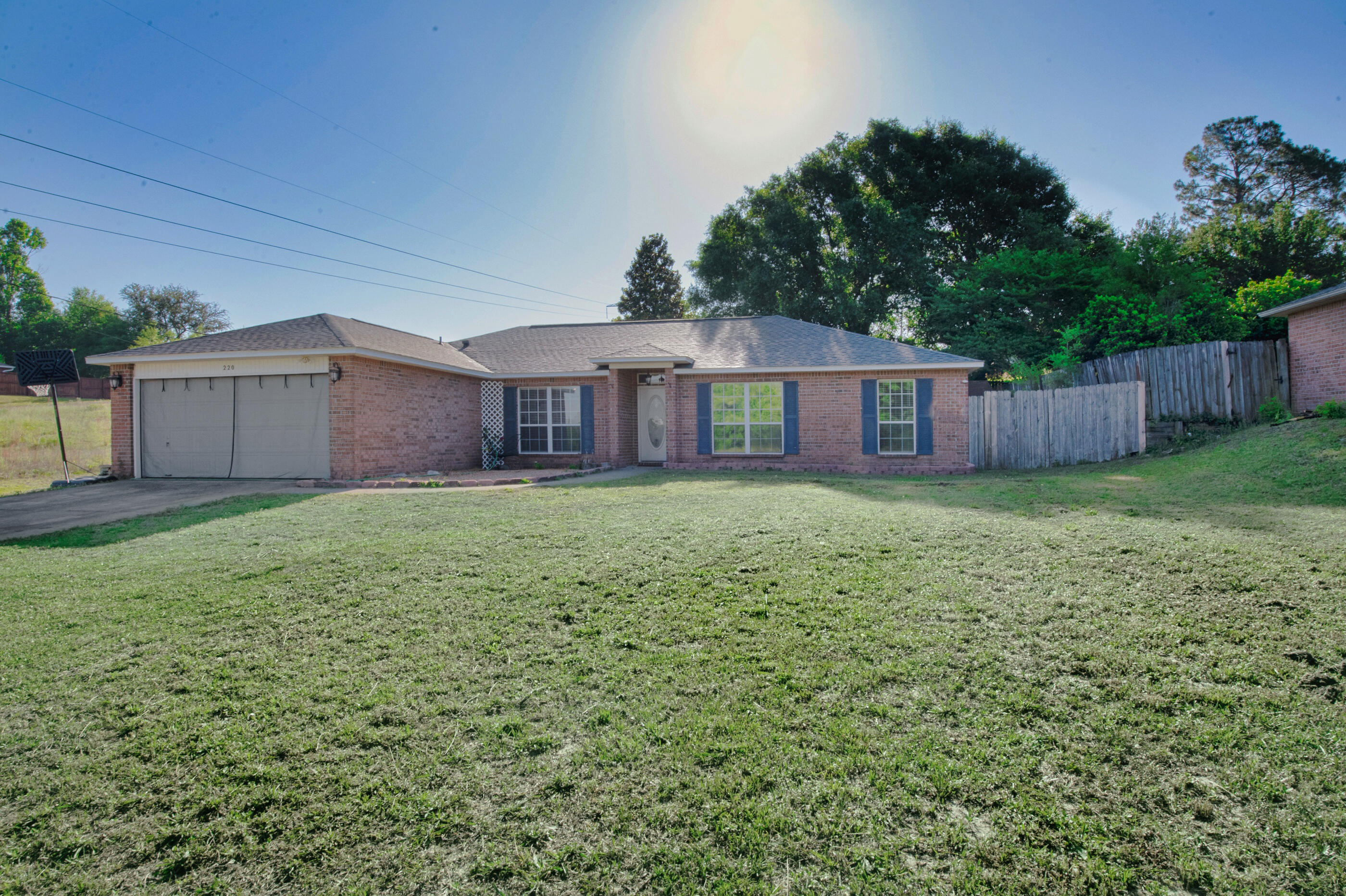 220 Riverchase Boulevard Crestview, FL 32536 - Photo 23 of 24 a house view with a garden space