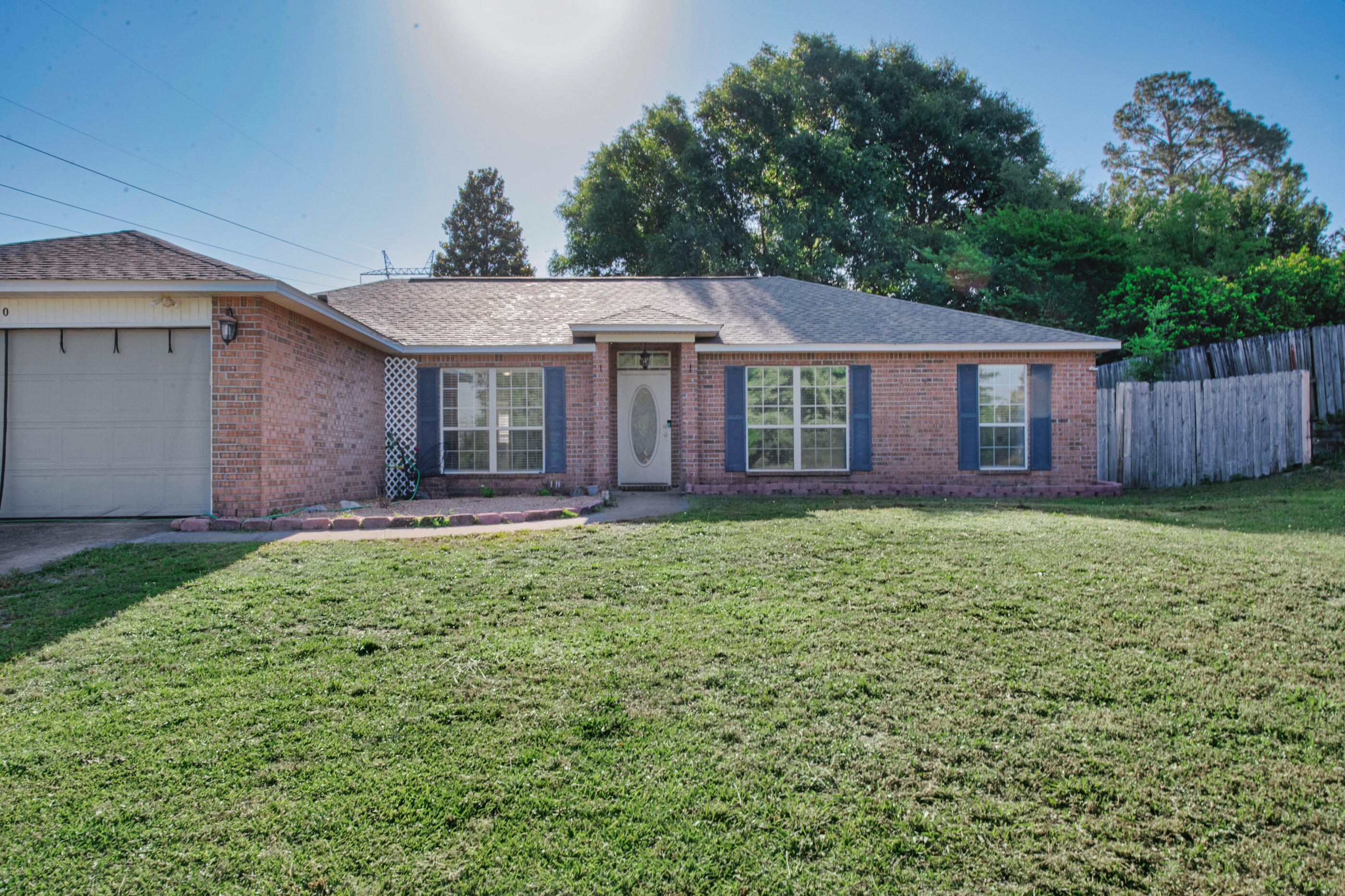 220 Riverchase Boulevard Crestview, FL 32536 - Photo 24 of 24 a front view of a house with garden