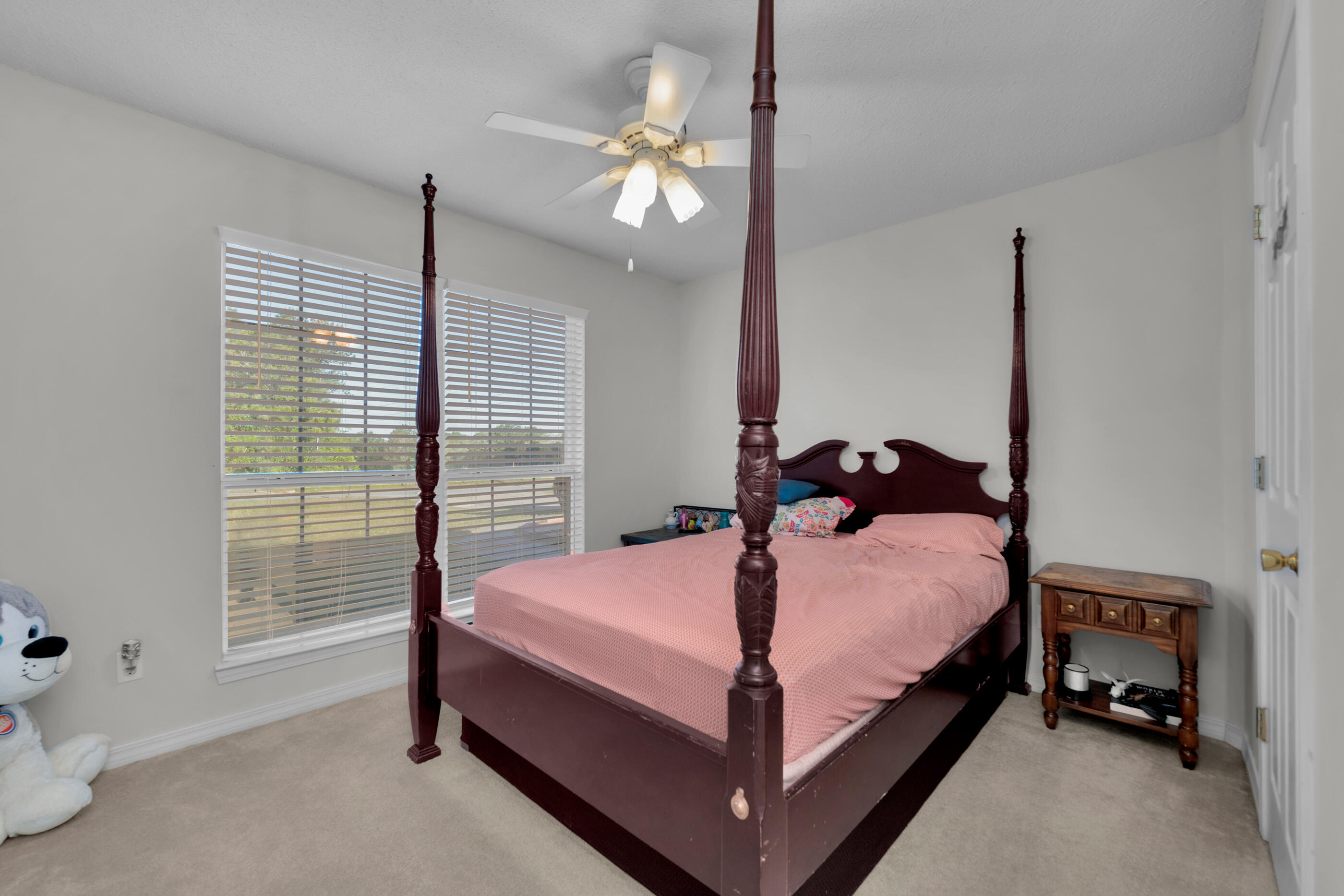 220 Riverchase Boulevard Crestview, FL 32536 - Photo 8 of 24 a bedroom with a bed and a window