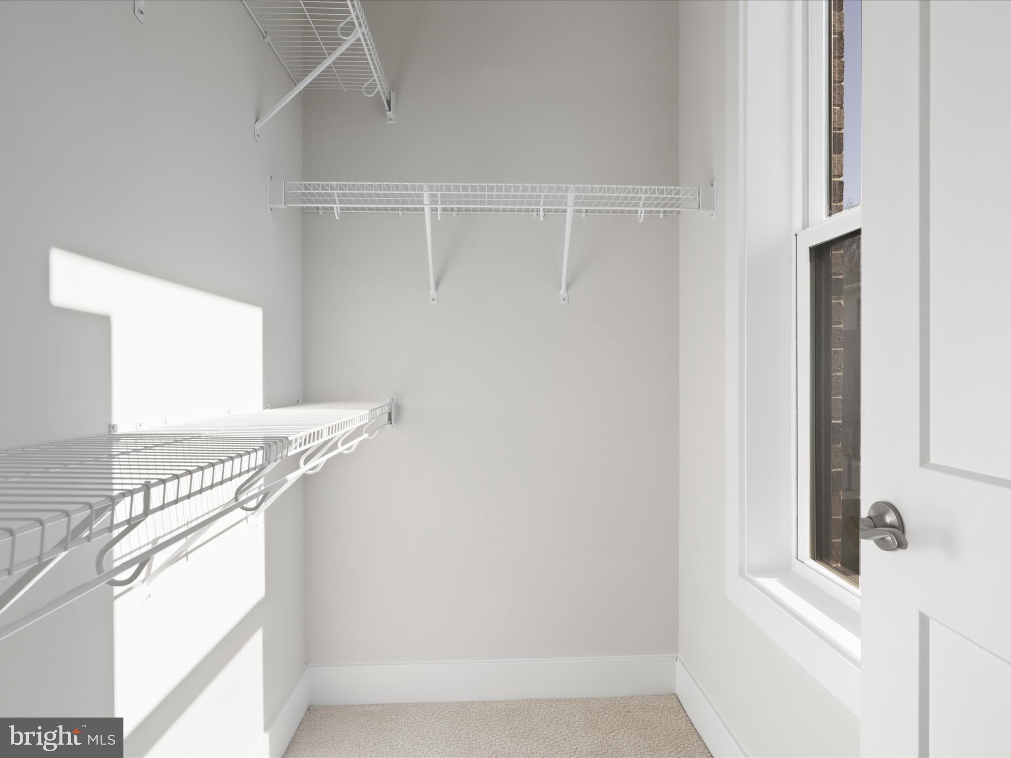 1696 Bandit Loop Reston, VA 20190 - Photo 12 of 38 a bathroom with a window