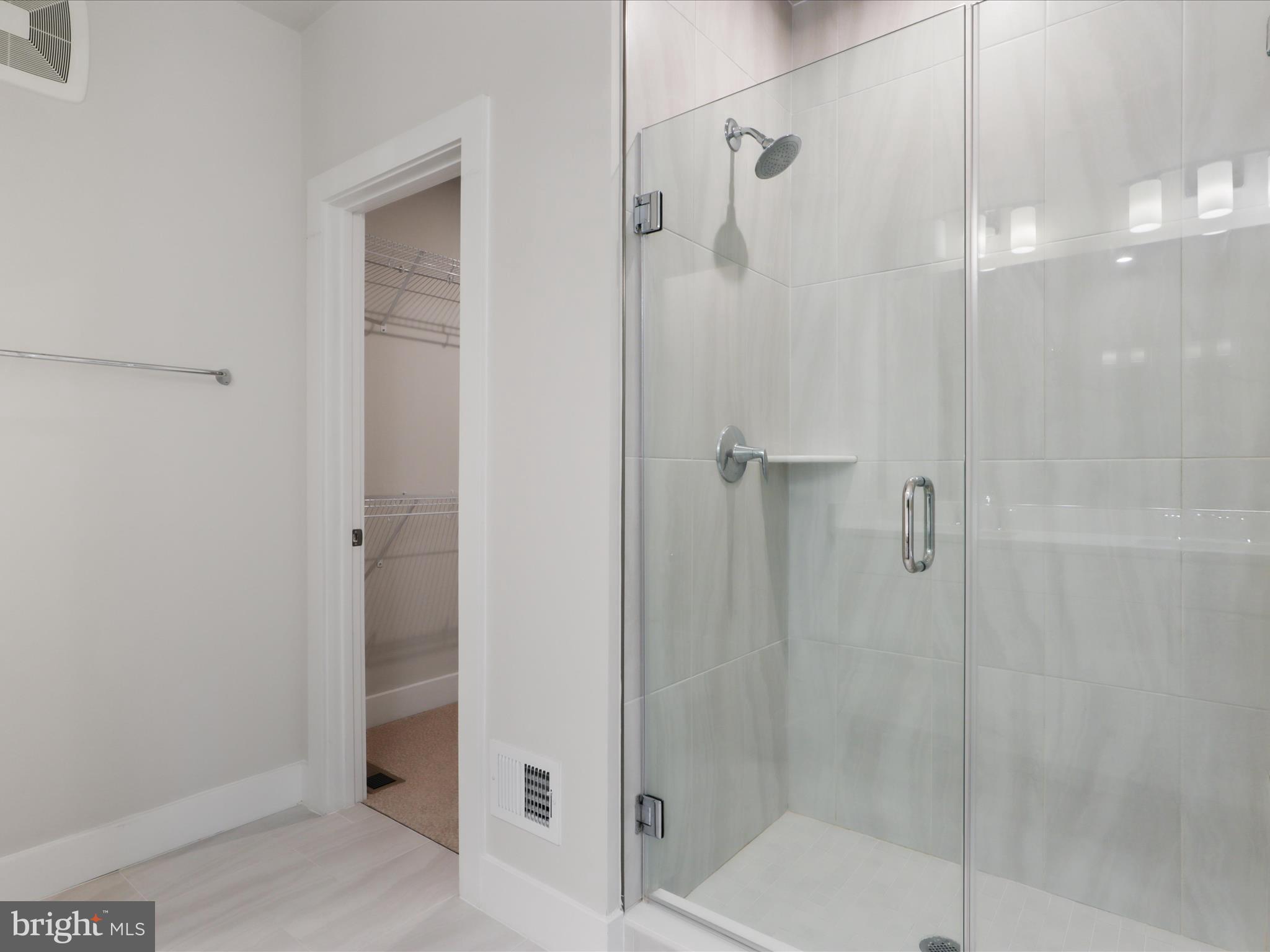 1696 Bandit Loop Reston, VA 20190 - Photo 15 of 38 a bathroom with a shower