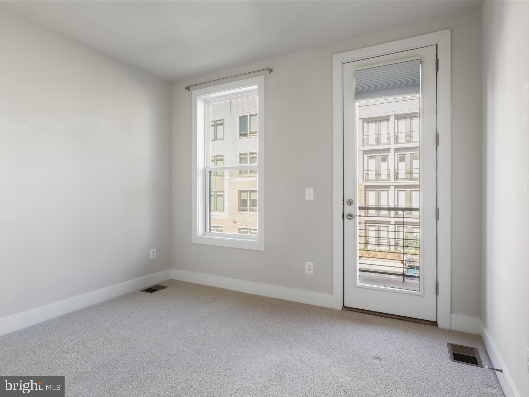 1696 Bandit Loop Reston, VA 20190 - Photo 17 of 38 an empty room with windows