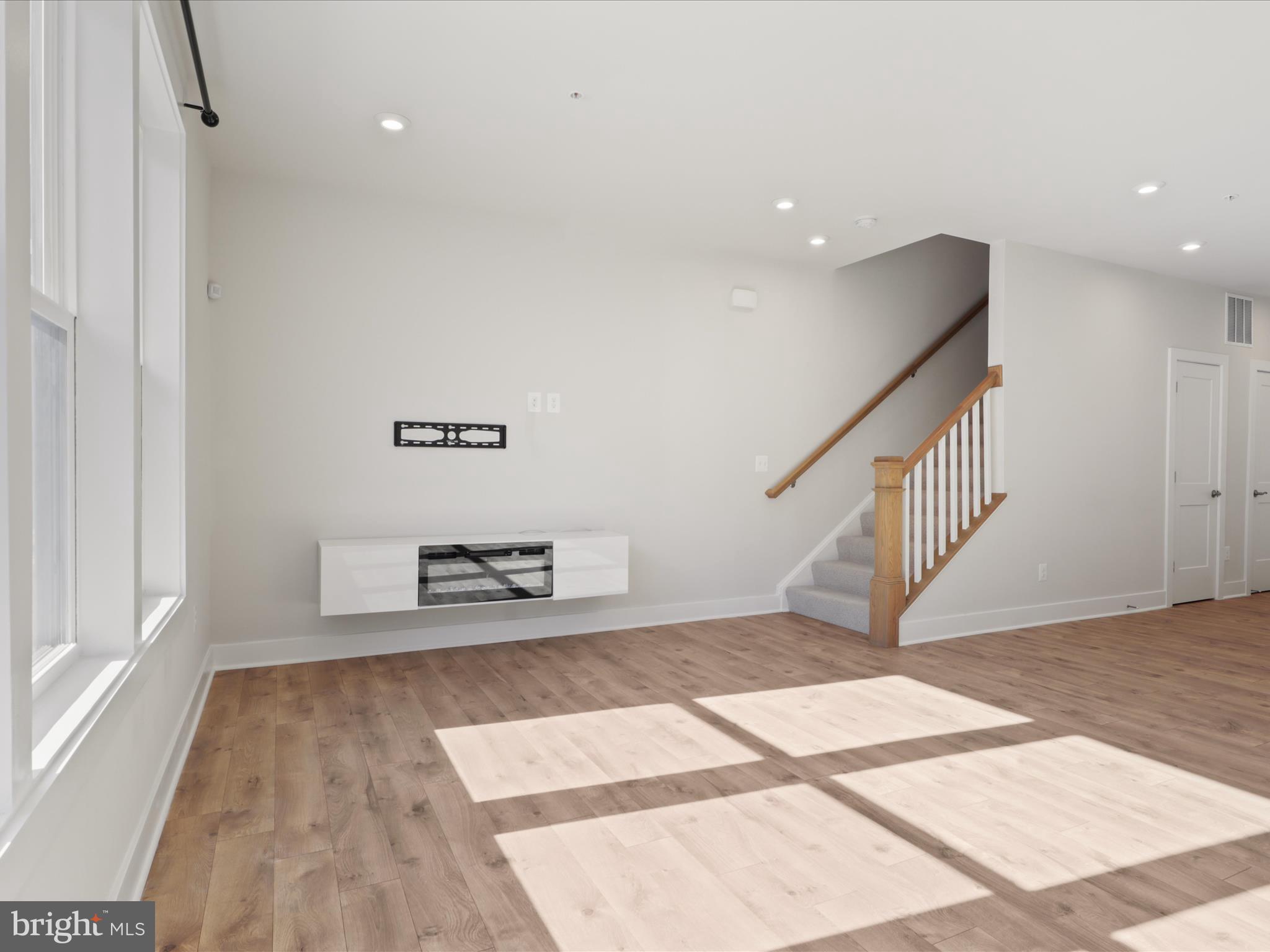 1696 Bandit Loop Reston, VA 20190 - Photo 2 of 38 a view of an entryway with wooden floor