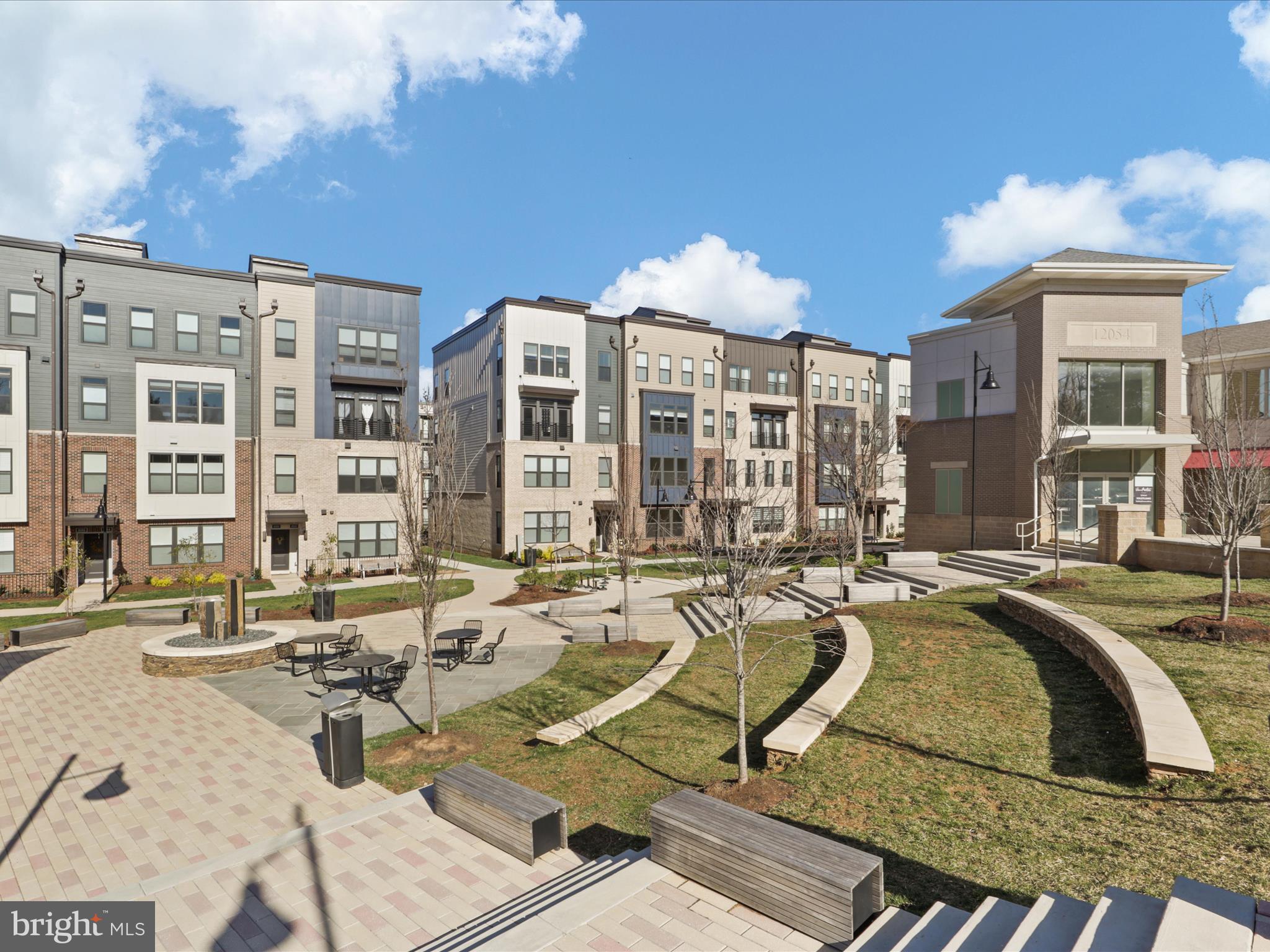 1696 Bandit Loop Reston, VA 20190 - Photo 28 of 38 a view of a swimming pool with outdoor seating