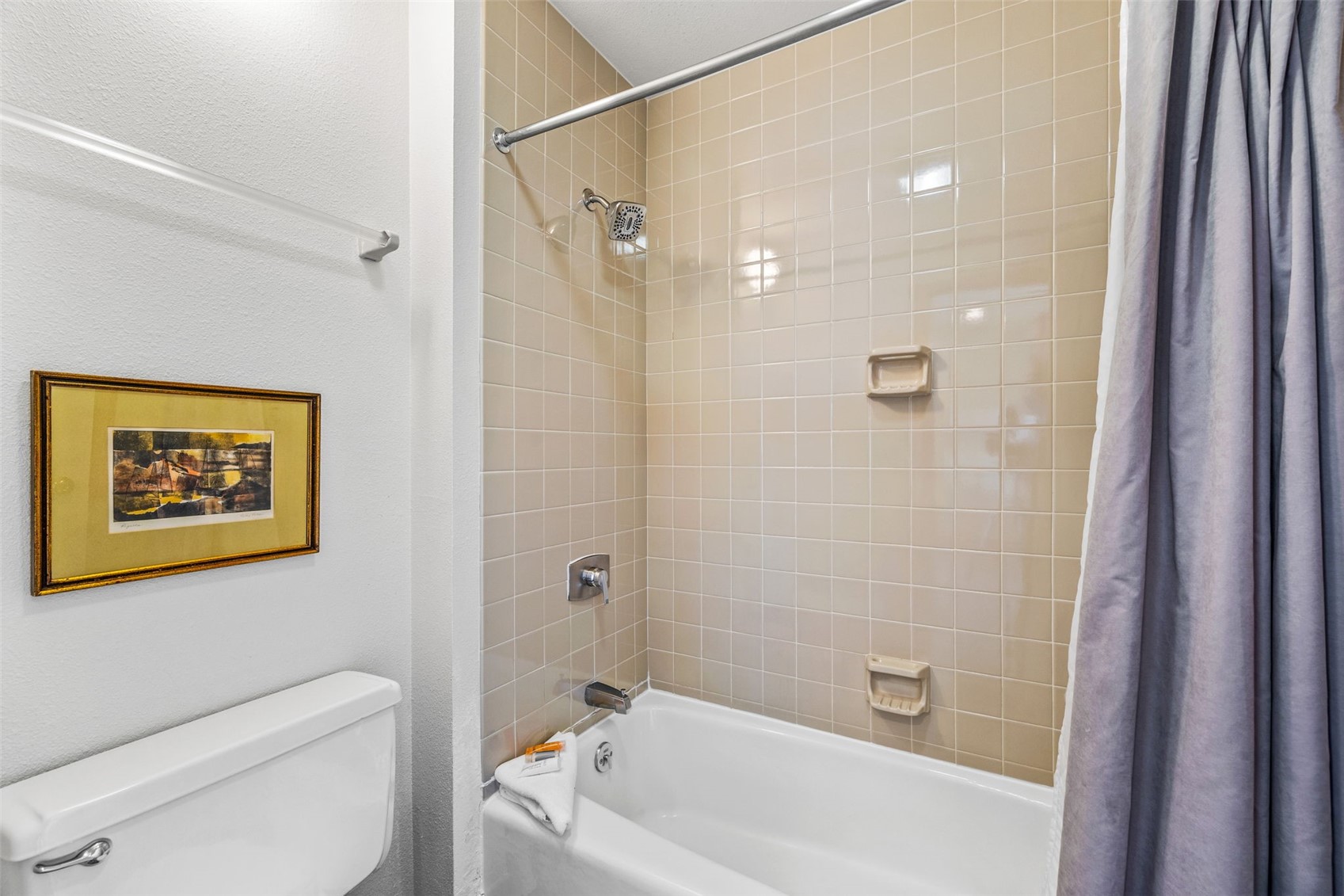 240 Tennis Club Road, Unit 1677 Keystone, CO 80435 - Photo 22 of 46 Bathroom featuring shower / bath combo with shower curtain and toilet