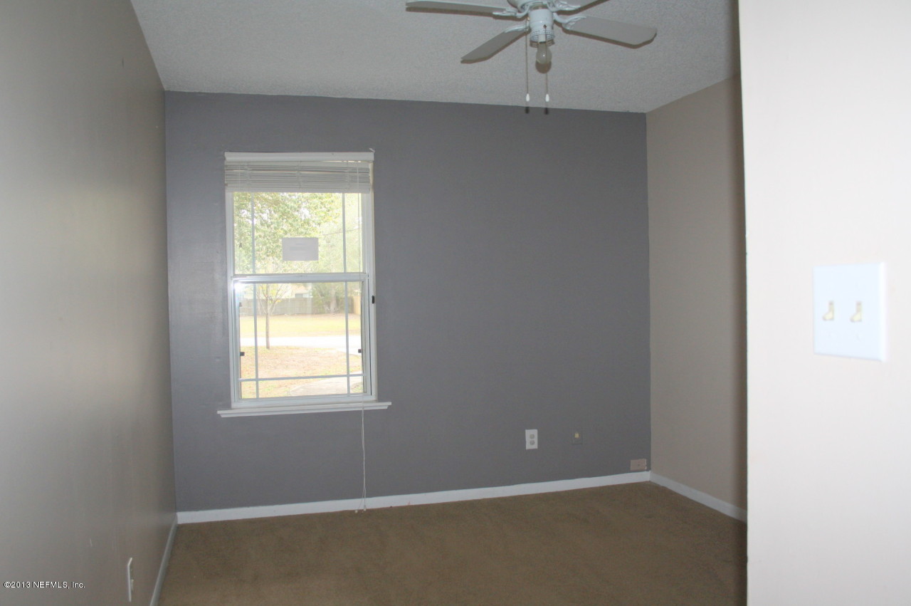 12880 Beaubien Road Jacksonville, FL 32258 - Photo 11 of 20 an empty room with a window