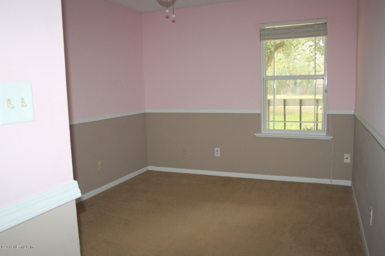 12880 Beaubien Road Jacksonville, FL 32258 - Photo 13 of 20 an empty room with a window