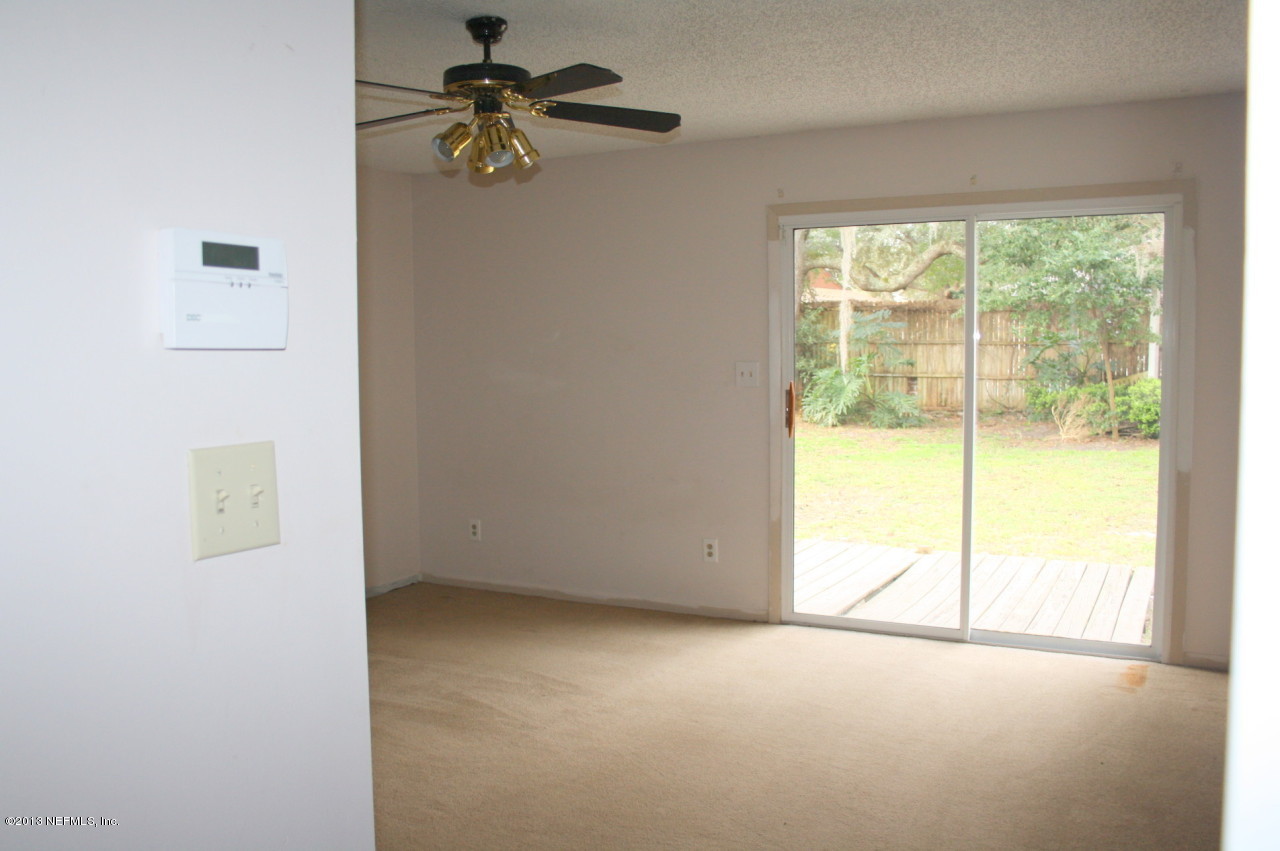 12880 Beaubien Road Jacksonville, FL 32258 - Photo 9 of 20 an empty room with a window