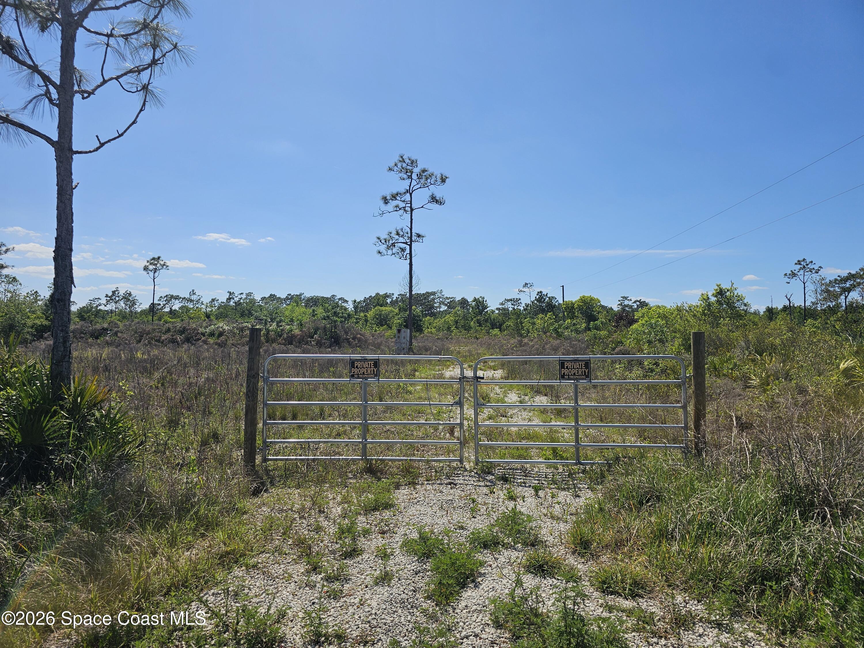 0 Harris Rd Street St. Cloud, FL 34773 - Photo 2 of 4 a view of lake with green space