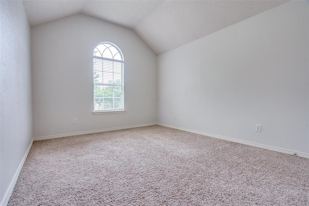 3421 Neiman Road Plano, TX 75025 - Photo 30 of 40 Unfurnished room featuring carpet and vaulted ceiling