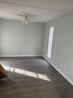 311 Elm Street Portland, TX 78374 - Photo 11 of 26 a view of a room with wooden floor and white walls