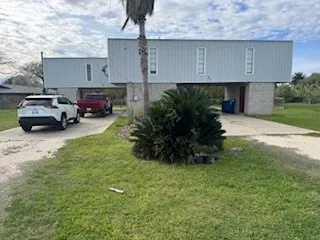a car parked in front of a house