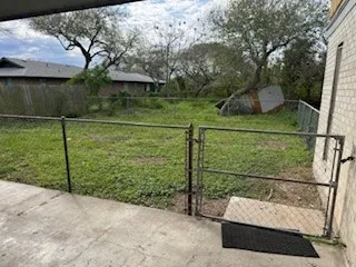a view of backyard with green space