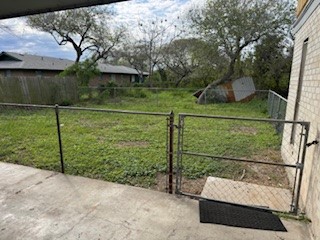 311 Elm Street Portland, TX 78374 - Photo 23 of 26 a view of backyard with green space