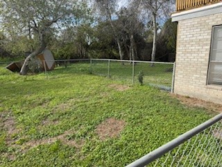 311 Elm Street Portland, TX 78374 - Photo 25 of 26 a view of a backyard