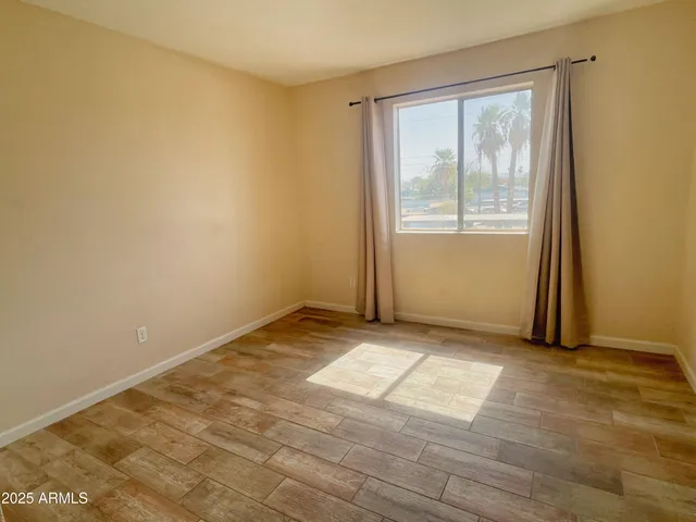 a view of an empty room and window