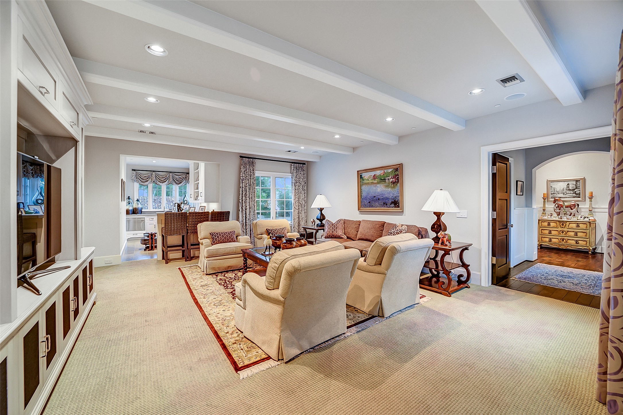 252 Piney Point Road Houston, TX 77024 - Photo 22 of 46 The spacious second floor game room features a built-in media cabinet alongside abundant shelving and storage.