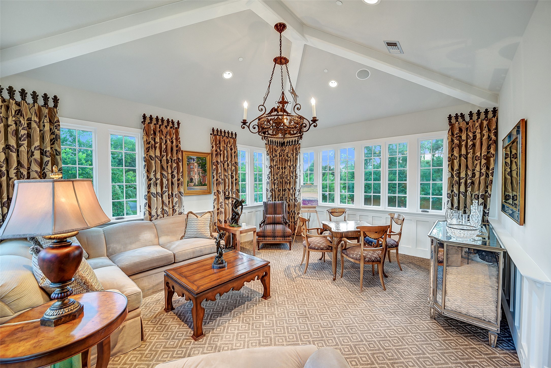 252 Piney Point Road Houston, TX 77024 - Photo 24 of 46 Adjacent to the game room the sunporch is enveloped by casement windows that invite abundant natural light. This room can accommodate a full-sized pool table
