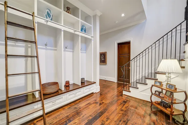 a front view of a house with lots of green space