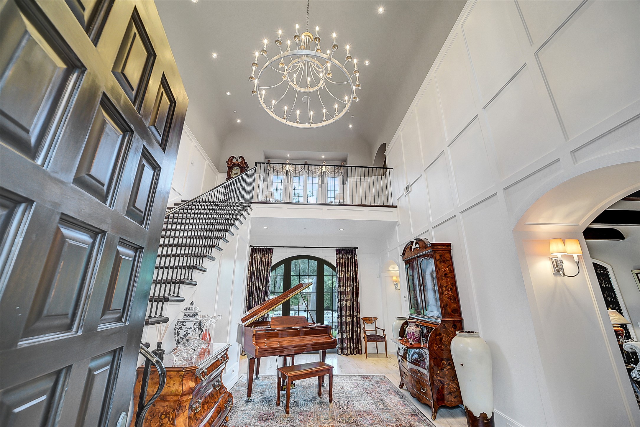 252 Piney Point Road Houston, TX 77024 - Photo 3 of 46 The stately two-story entry is beautifully illuminated with natural light and accented with an impressive chandelier.