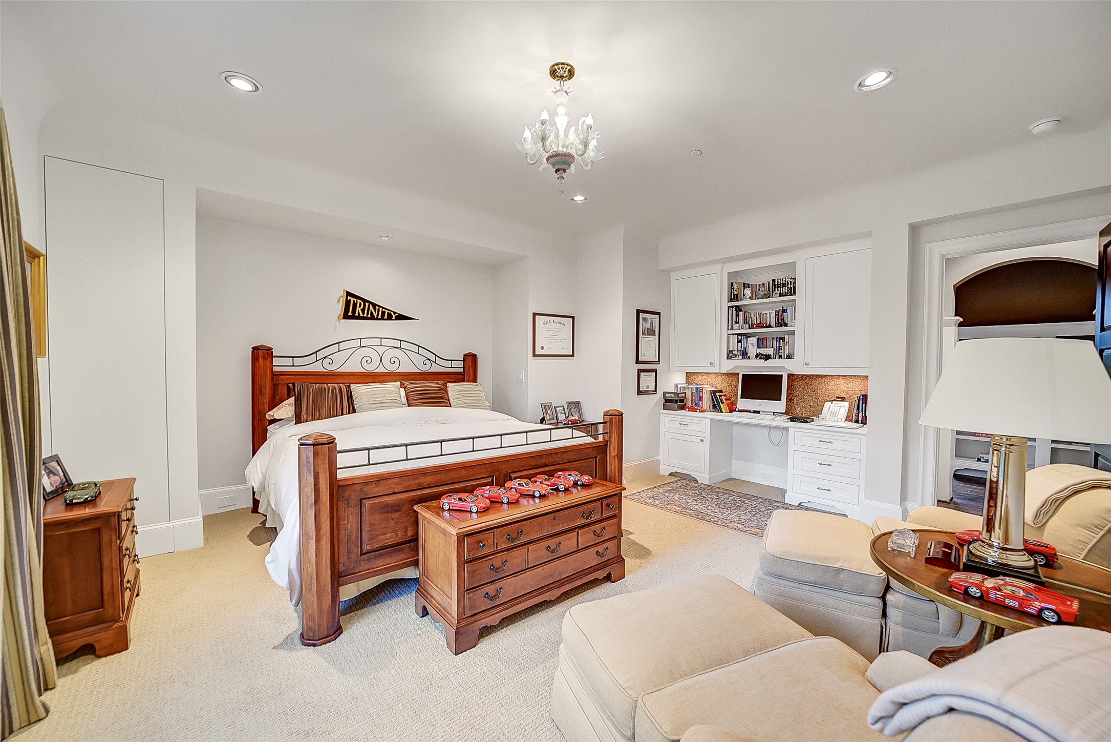 252 Piney Point Road Houston, TX 77024 - Photo 38 of 46 Generously sized secondary bedroom features a built-in desk and architectural detail.