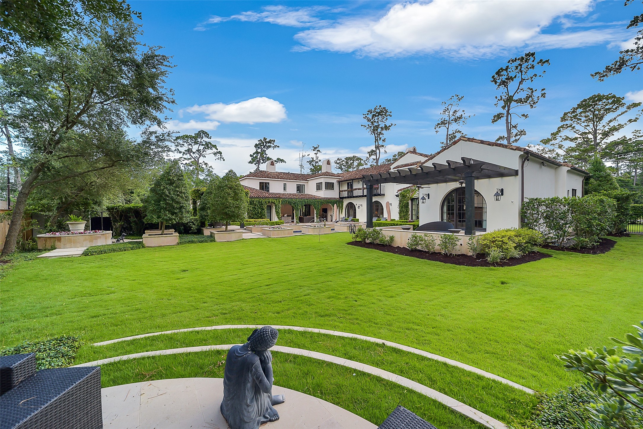 252 Piney Point Road Houston, TX 77024 - Photo 45 of 46 Views of the expansive green space from the gas-log firepit.