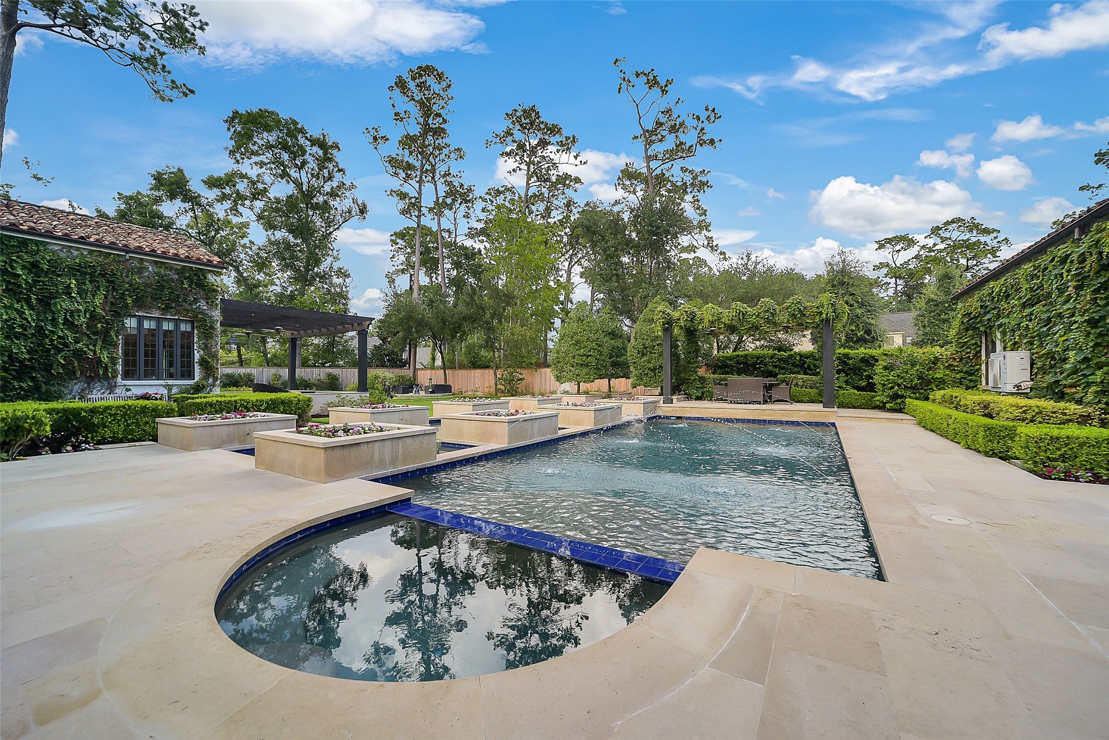 252 Piney Point Road Houston, TX 77024 - Photo 46 of 46 The jacuzzi provides a serene sanctuary to unwind, rejuvenate, and savor the beautiful surroundings.