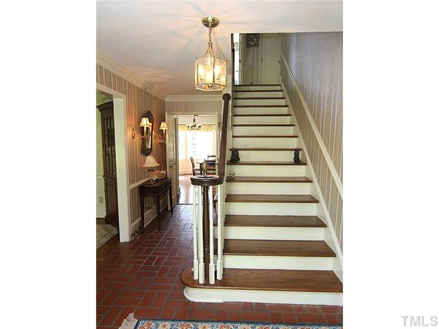 12209 Old Creedmoor Road Raleigh, NC 27613 - Photo 4 of 24 Custom trim work and elegance defines this home. Foyer
