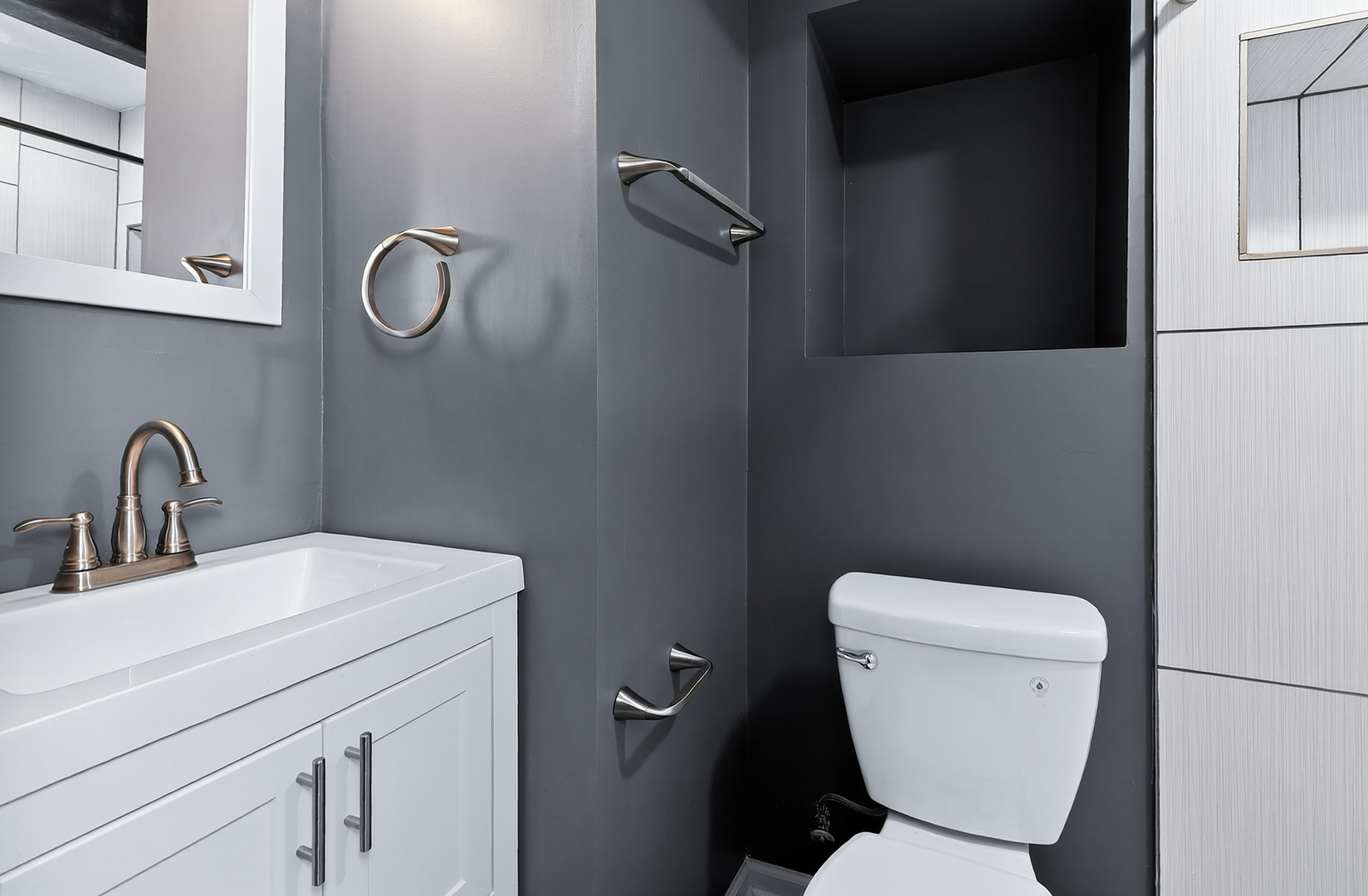 110 Harper Lane Lemont, IL 60439 - Photo 17 of 29 a bathroom with a toilet sink and mirror